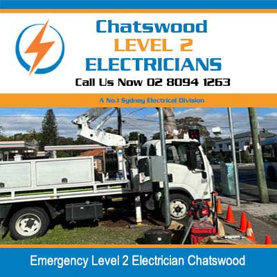 Emergency utility truck with boom lift and safety cones at street work site in Chatswood