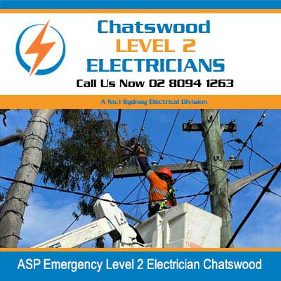 Emergency electrician in cherry picker bucket working on power lines between poles in Chatswood