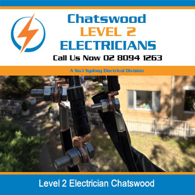 Close-up of level 2 electrician working on overhead power lines and equipment in Chatswood
