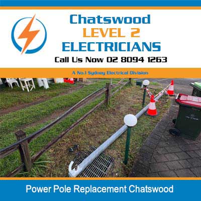 Power pole for replacement with safety cones and fencing at work site in Chatswood
